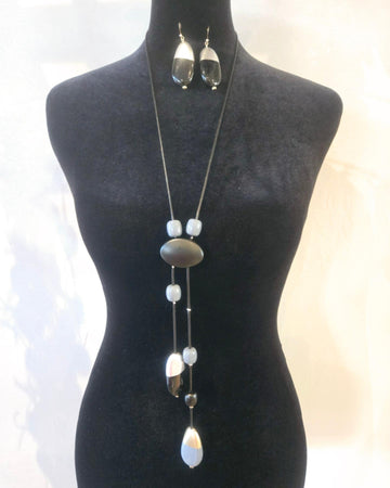 long cord necklace with gray black and gold  accents, beads and stones