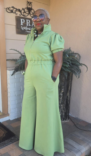 Retro Chick Jumpsuit, elastic waist and puff capped sleves, upper zipper and  wide leg bell bottom legs and pockets. Available in Mint Green or Heather Gray